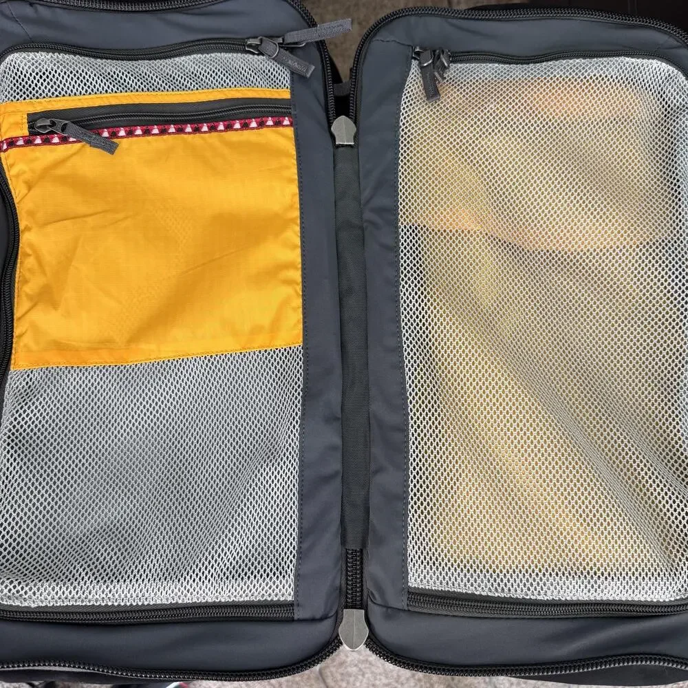 cotopaxi Black Backpack with Brown Accents